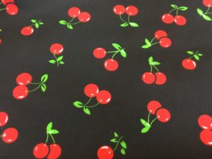 black background red cherries dress fabrics
