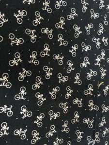 black background white bicycles fabric