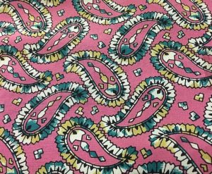 pink background paisley pattern fabric