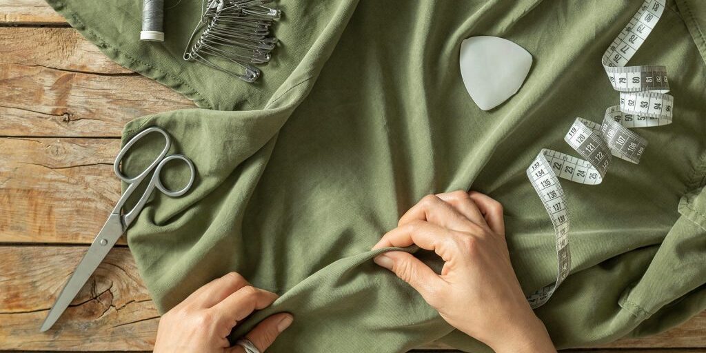 close-up-hands-holding-fabric 1